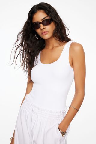 Totally Winning White Ribbed Sleeveless Bustier Tank Top