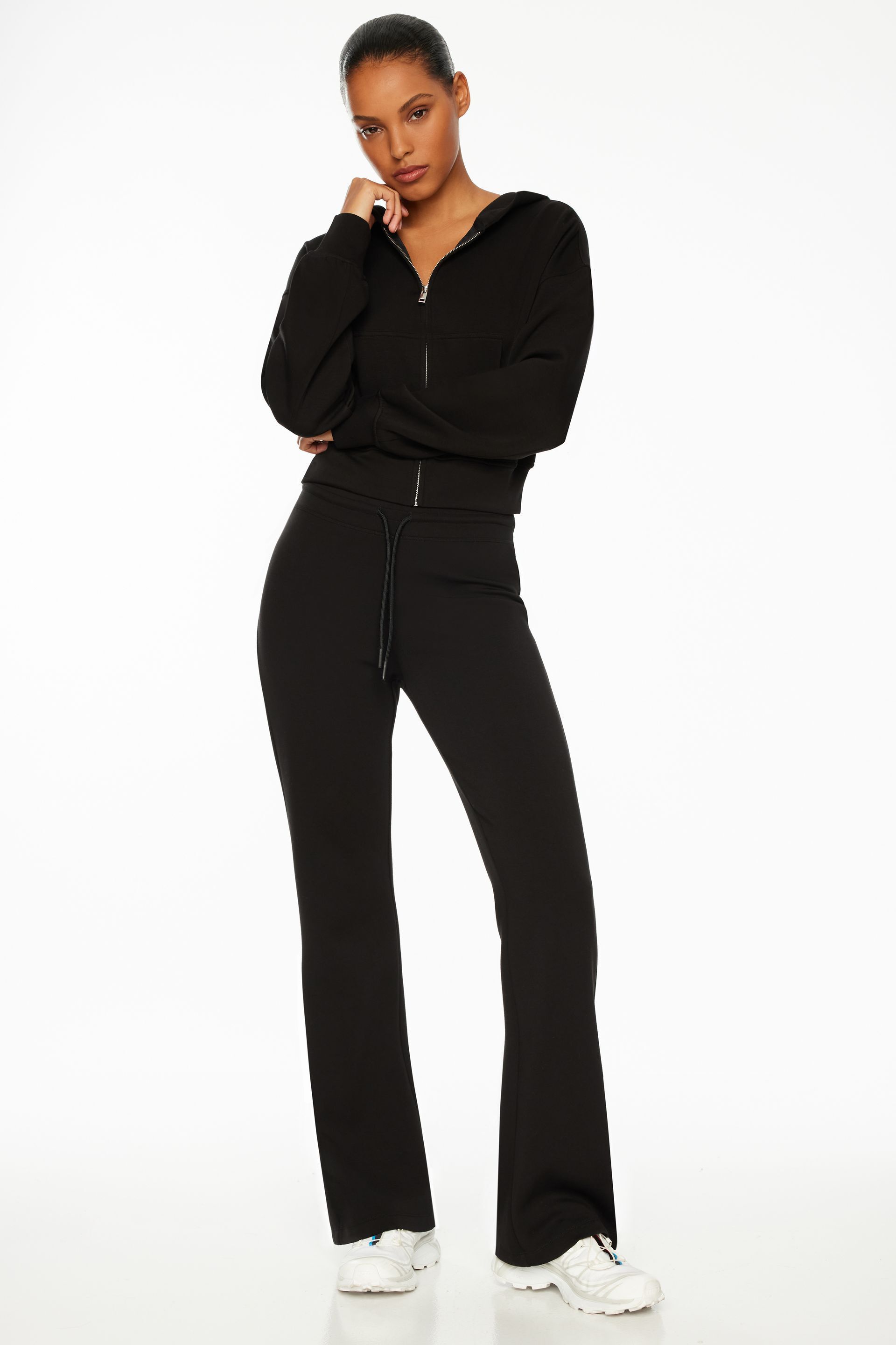 ASOS DESIGN tapered sweatpants in scuba fabric with pin tucks & fixed hem  in black | ASOS