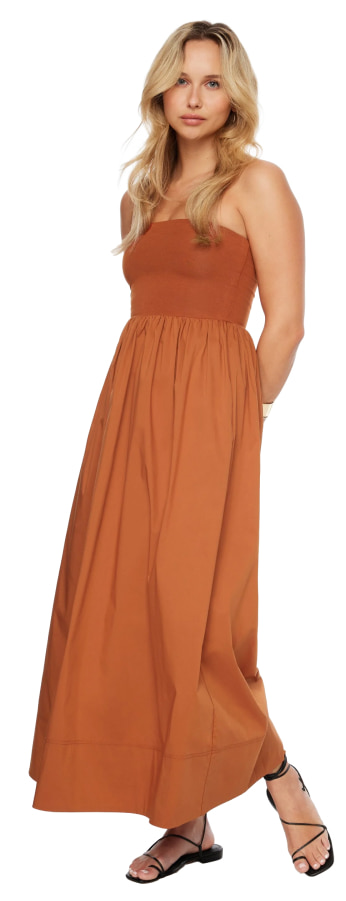 Model is wearing an orange tube maxi dress.